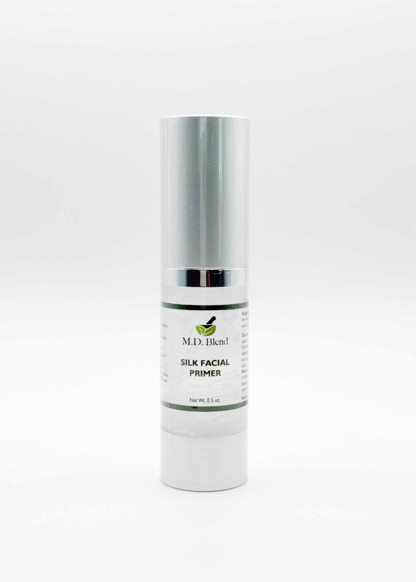M.D. Blend Silk Facial Primer in a bottle on a white background