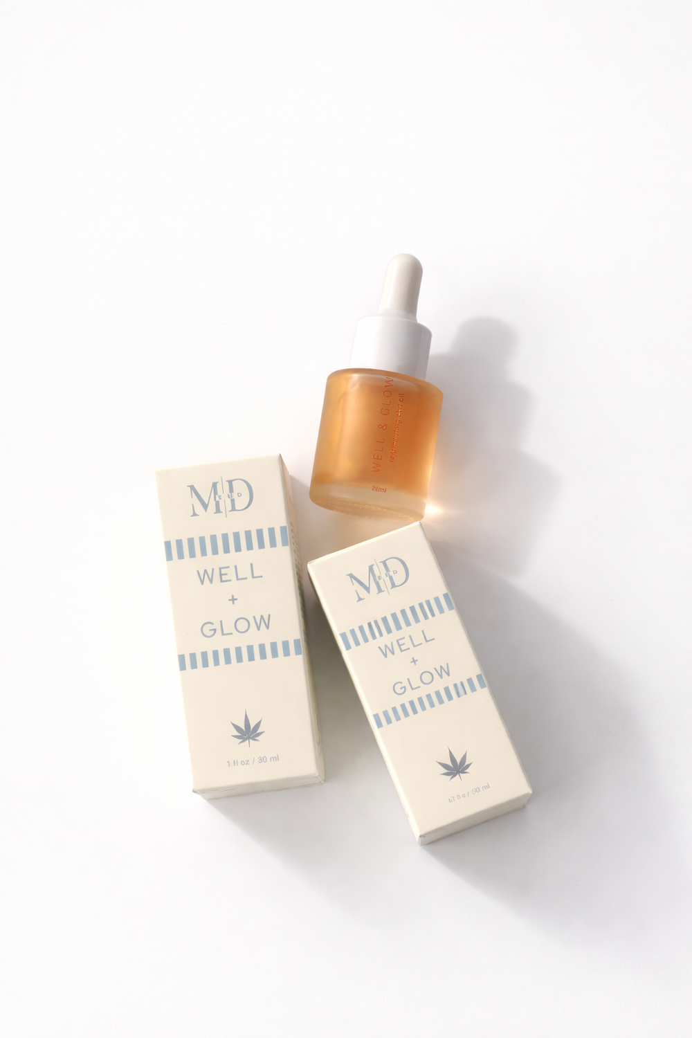 Well & Glow skincare product with packaging on a white background