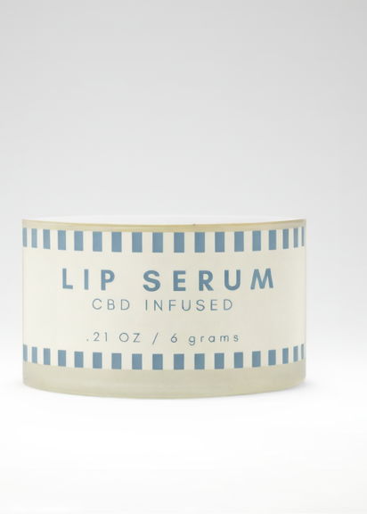 CBD-infused lip serum container with blue text on a white background