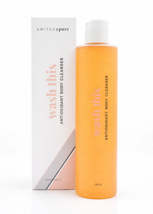 Orange bottle of 'Wash This' antioxidant body cleanser with packaging on a white background