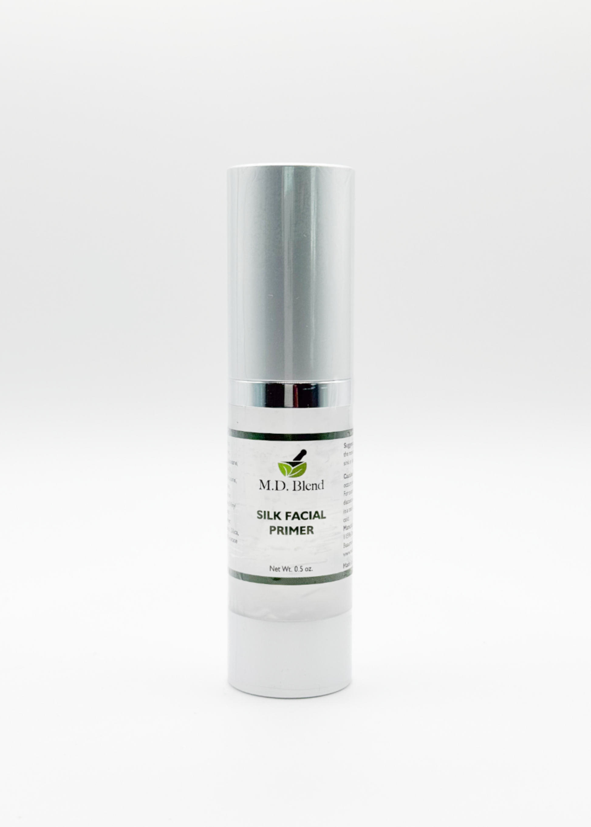 M.D. Blend Silk Facial Primer in a bottle on a white background