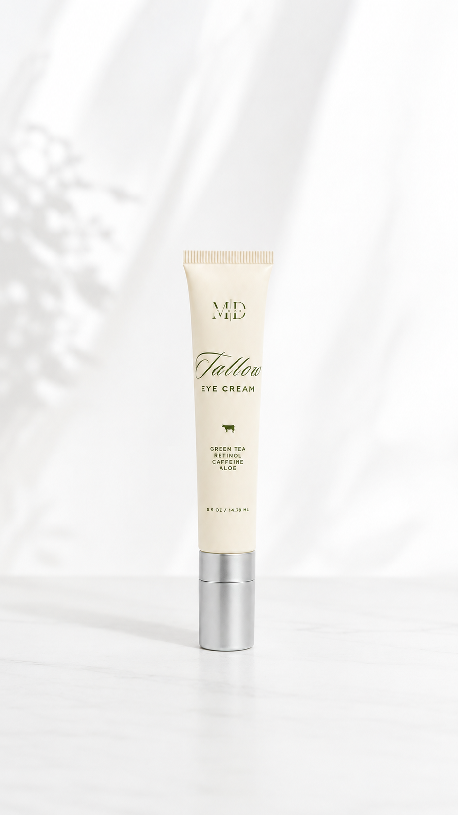 M.D. Blend Tallow Eye Cream with caffeine and retinol for puffiness and dark circles