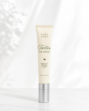 Tube of eye cream with visible branding on a white background