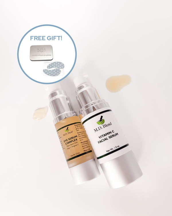 two skincare bottles from M.D. Blend with eye serum and vitamin c facial serum